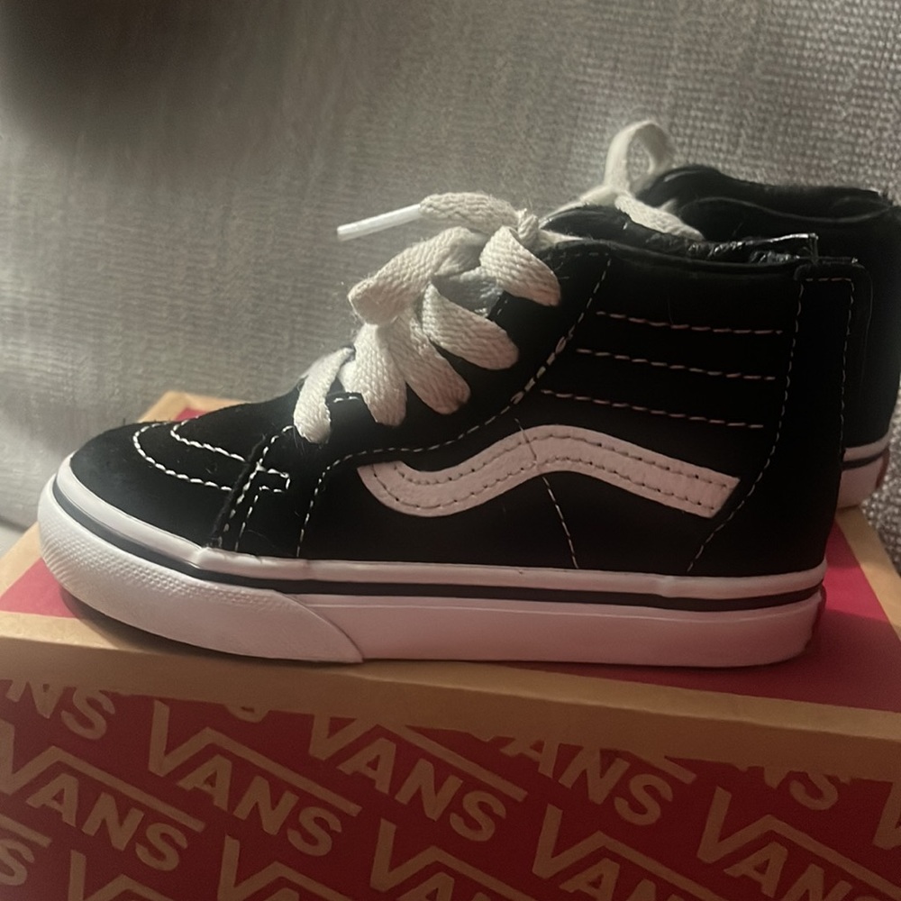COPY - Like new: Sk8 Hi Zip Black and White Vans in Size 8.